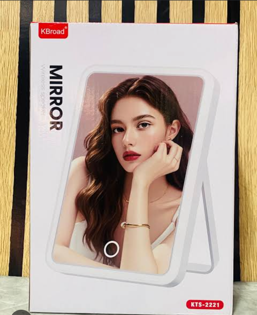 KBroad Mirror Wireless Speaker (Model: KTS-2221), a tabletop makeup vanity mirror featuring built-in LED front lighting and an integrated wireless Bluetooth speaker